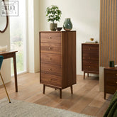 Sleek medium brown solid walnut wright walnut tallboy chest with five drawers and brass round knobs