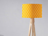 Yellow lampshade with white geometric design on a wooden tripod base perfect for table lamp or ceiling lamp shade