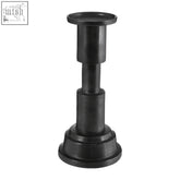 Black metal zac small candle holder with tiered cylindrical sections and flat top for small candle display