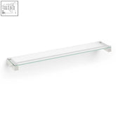 Clear glass bathroom shelf with sleek white stainless steel brackets from the carvo bathroom collection