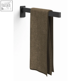A plush olive green towel hangs on the sleek black stainless steel zack linea towel holder 42 cm