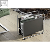 Zack Mecor sophisticated black magazine rack with sleek stainless steel frame and dark gray panel holding magazines