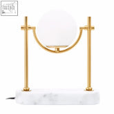 Gold orb table lamp with a spherical frosted glass globe and white marble base from zalika marble gold orb collection