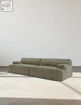 Olive green velvet zephyrine bean bag sofa with clean modern lines and segmented cushioning two seater bean bag sofa