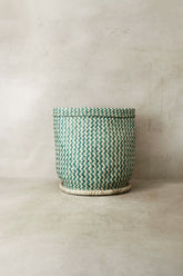 Green and white zig zag woven planter basket with matching lid made in malawi perfect for indoor plants