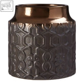 Copper-toned ceramic large planter with textured geometric pattern in the zircon large planter collection