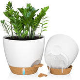 White ceramic self-watering plant pots with drainage holes saucer cork base and blue water level indicator for indoor outdoor plants