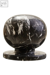 Zoro black and white veined marble ball sculpture with a rounded bulbous top on flat circular base