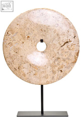 Beige zoro large natural speckled marble disc sculpture with central hole on black metal stand, 30cm round shape