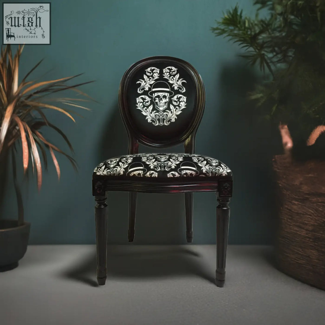 Dan gold bowler chair black upholstered with ornate white skull and floral embroidery and high density foam seat