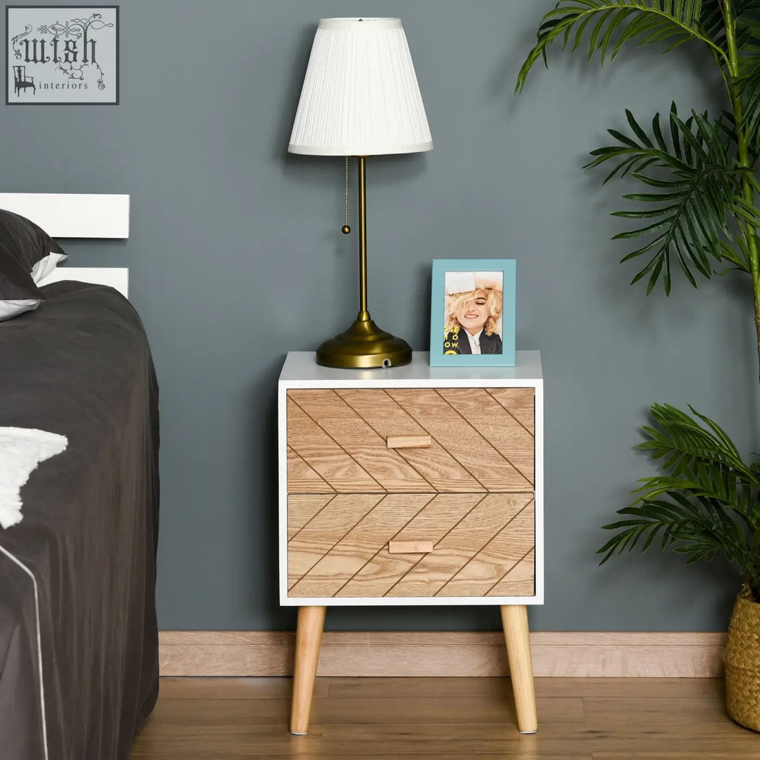Modern white and light wood bedside table with chevron pattern, two drawers, and pine legs wood framework