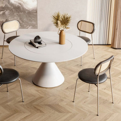 a modern ozzie rattan dining chair with a woven cane backrest orange seat and slim chrome legs