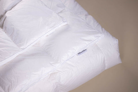 White quilted 10.5 tog siberian pure goose down duvet with soft plush texture and subtle stitching details