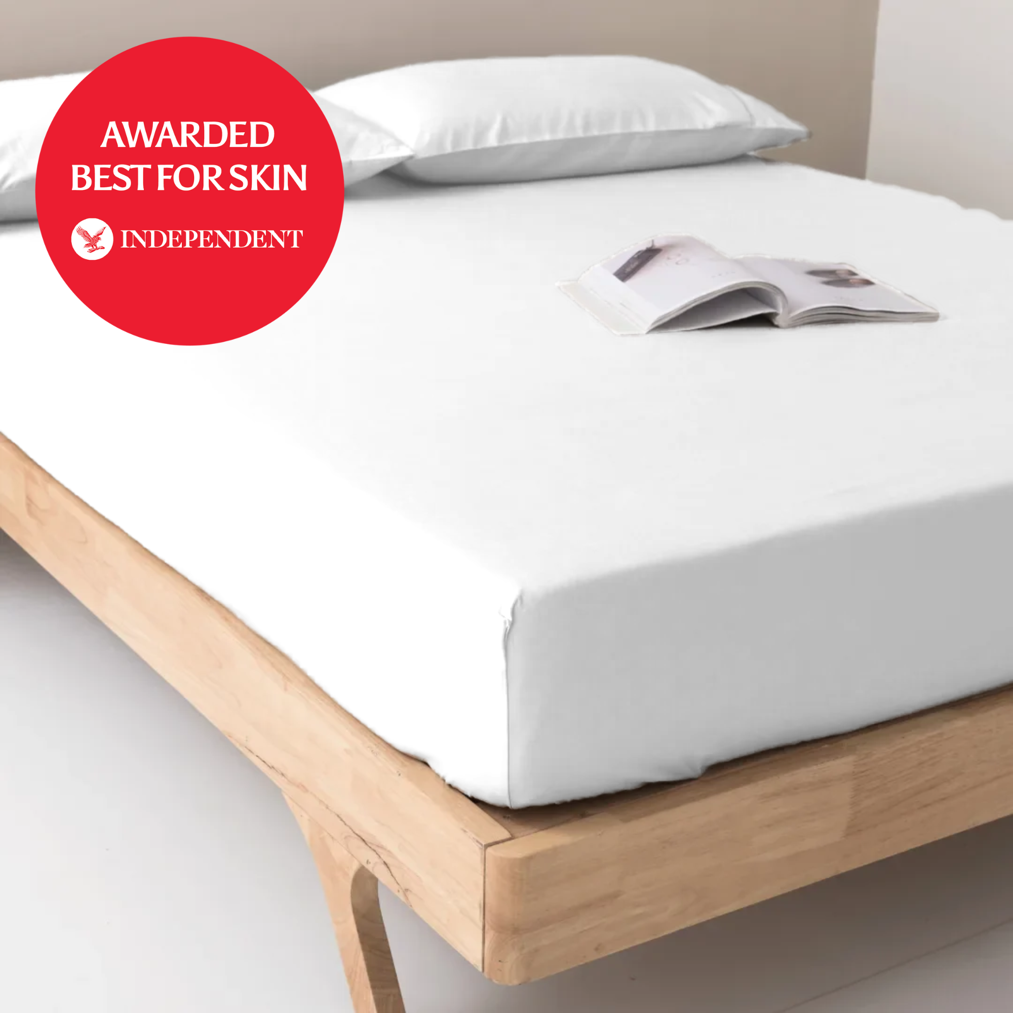 White smooth-finish 100% organic bamboo flat bed sheet with snug fit and clean edges on cotton mattress
