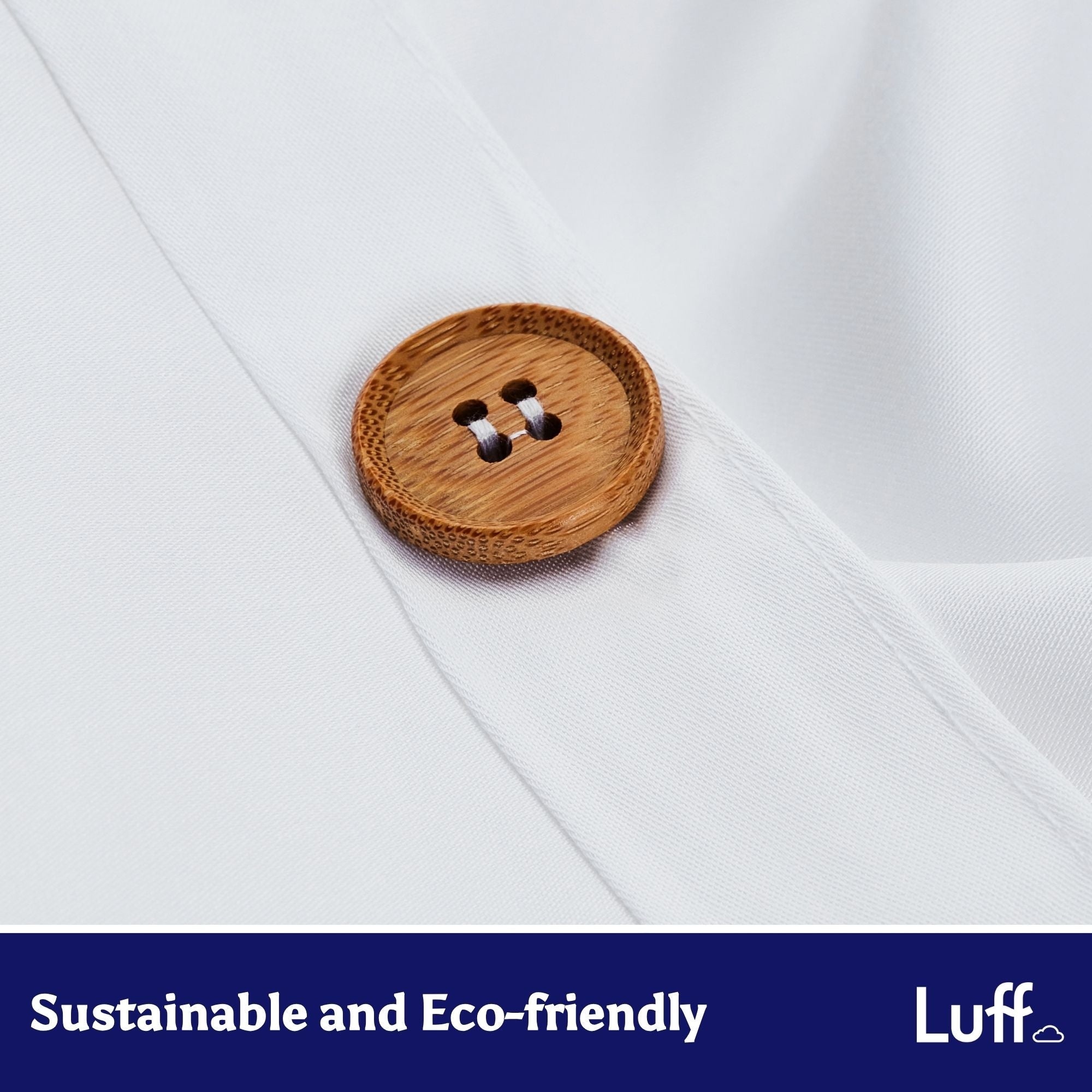 Round light brown wooden button with natural grain on 100% organic bamboo silk duvet cover