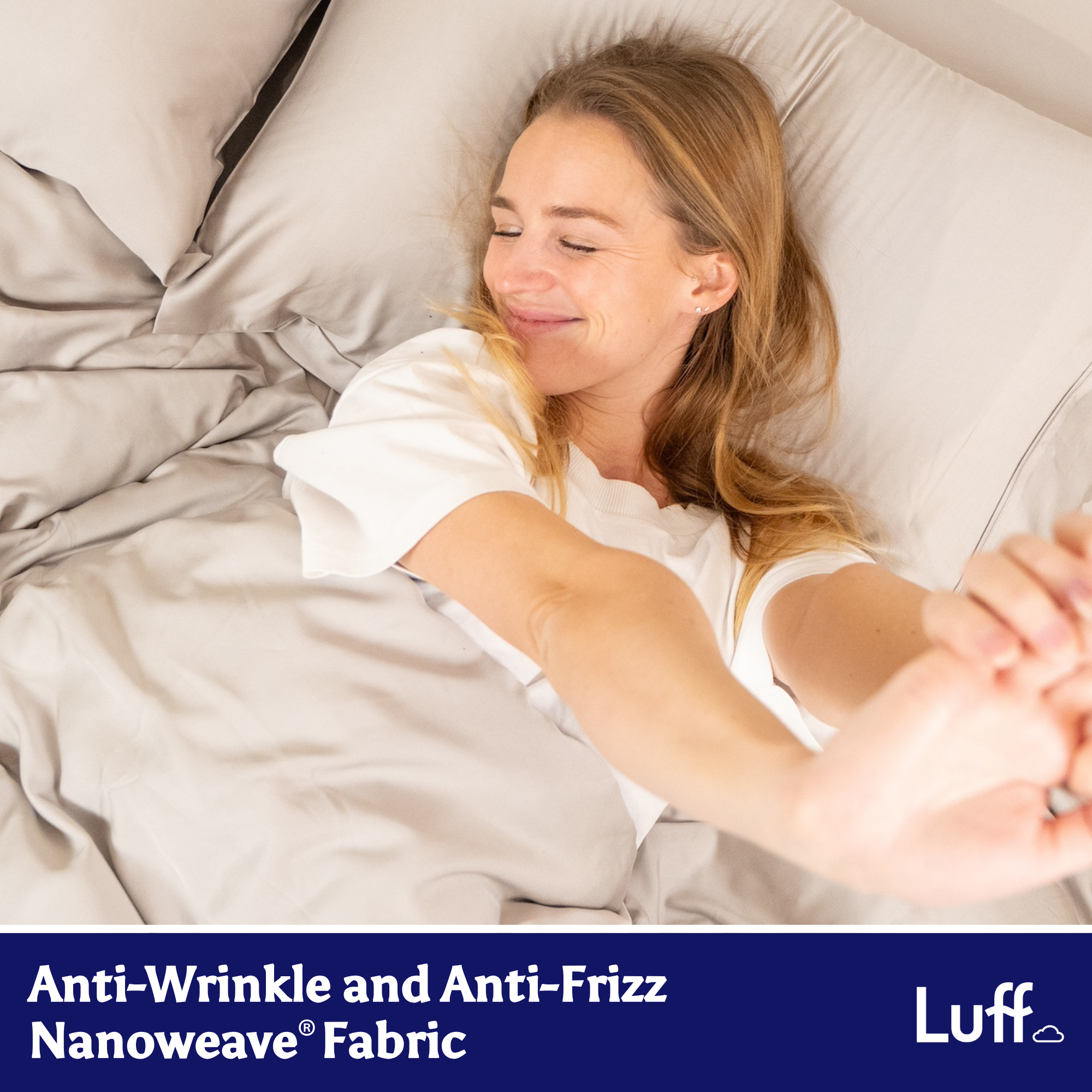A soft light gray satin duvet cover made from luffs anti-wrinkle and anti-frizz nanoweave fabric organic bamboo silk