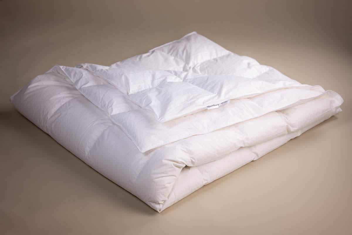 White quilted 13.5 tog winter goose down duvet with soft plush texture and clean minimalist design