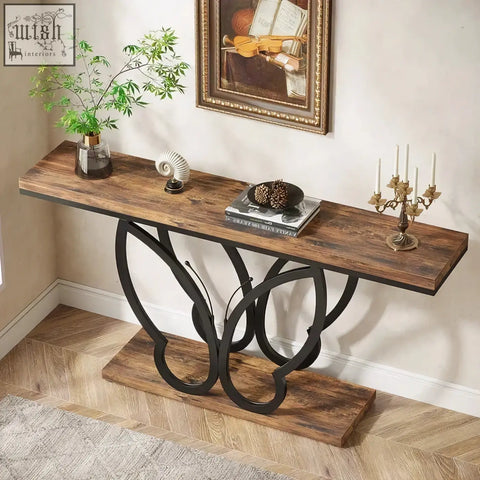 Rustic wooden console table with butterfly metal frame and black metal legs perfect as a sofa table or entryway piece