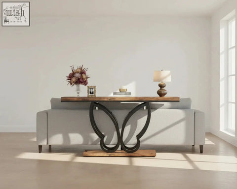 Sleek 140cm console table with dark butterfly metal frame and rustic wooden top perfect for sofa area
