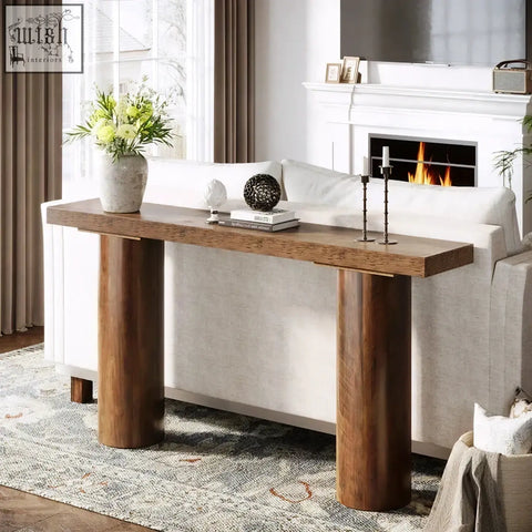 Rustic wooden 160cm console table with thick cylindrical legs and smooth medium brown finish for sofa or bar use