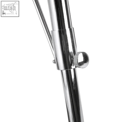 Shiny chrome metal pole with rounded knob for height adjustable industrial revolution tripod floor lamp