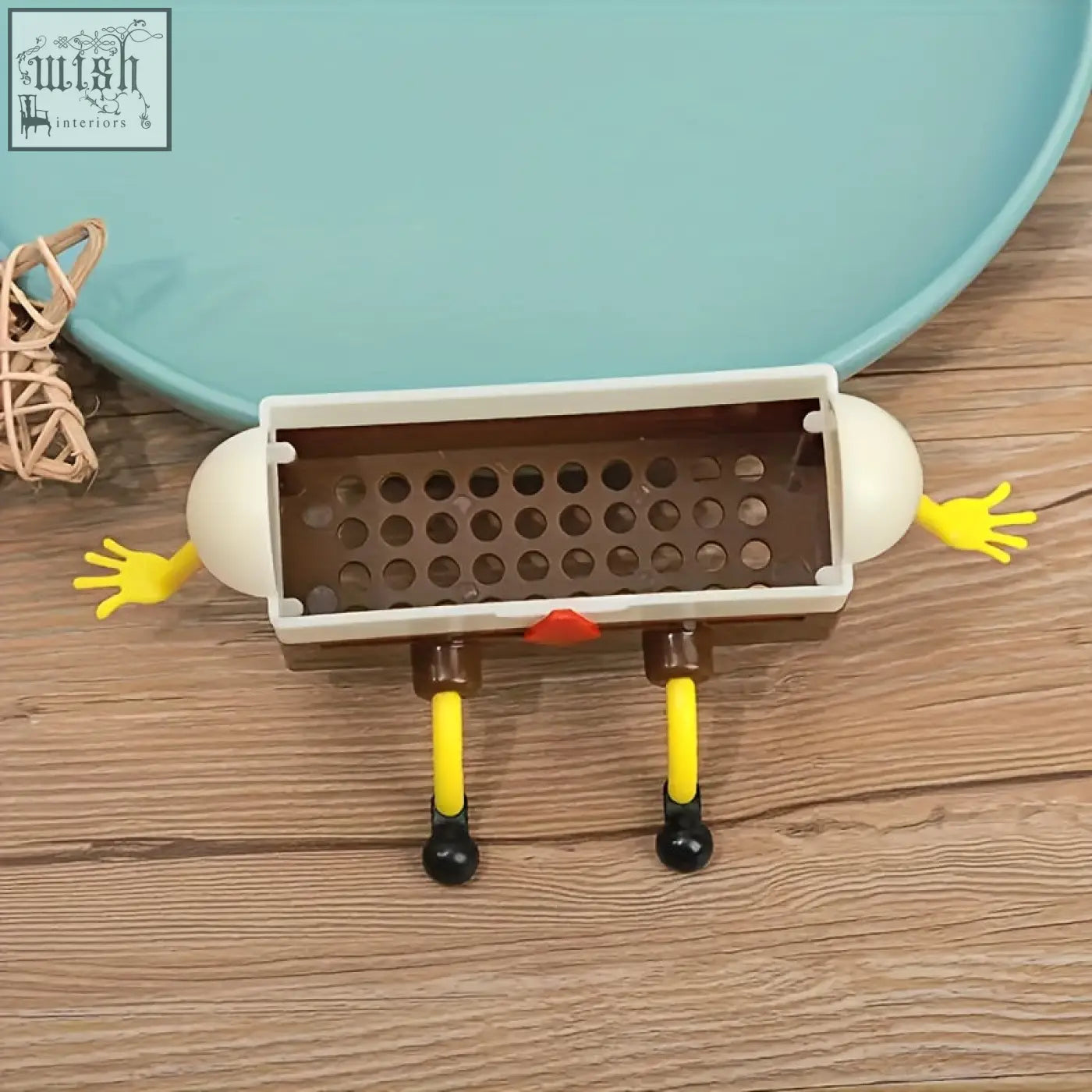 A whimsical brown and white cartoon sponge drain rack made of plastic with special features for bathroom and kitchen use