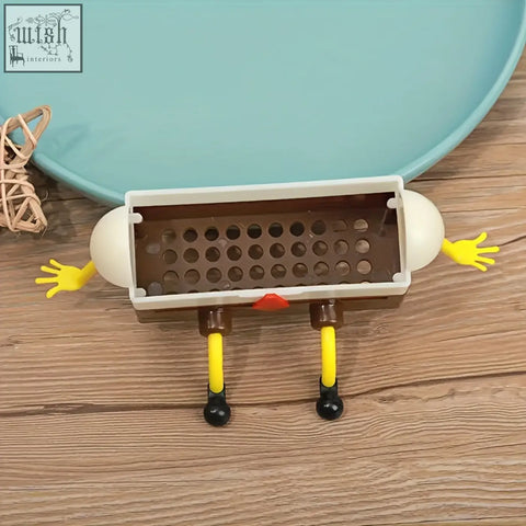 A whimsical brown and white cartoon sponge drain rack made of plastic with special features for bathroom and kitchen use