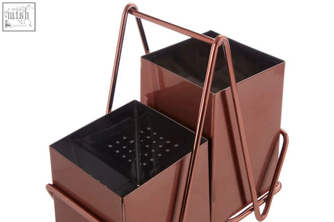 Copper-toned metal mop bucket and wringer set with black interior matching rose gold cutlery caddy style