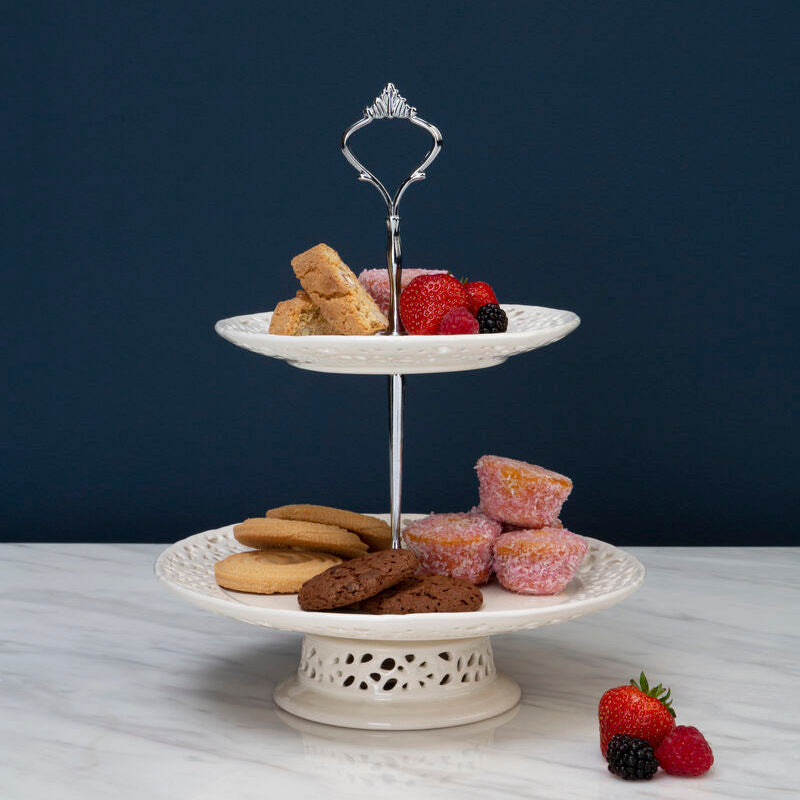 White ceramic lace cake plate with two tiers and ornate silver handle perfect as a lace cake plate or cake plate