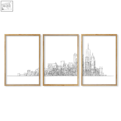 Three framed minimalist new york skyline wall art prints in light wood for living room decor with black line art