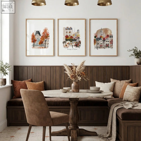 Marble-top dining table with dark wood pedestal base paired with eiffel tower autumn paris travel art prints in dining room