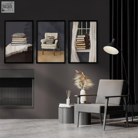 Gray upholstered armchair with dark wooden frame beside 3 piece wall art framed in moody grey tones for bohemian decor