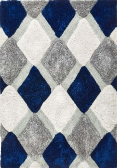 A plush 3d navy geometric shaggy rug with bold navy blue gray and white interlocking diamond pattern
