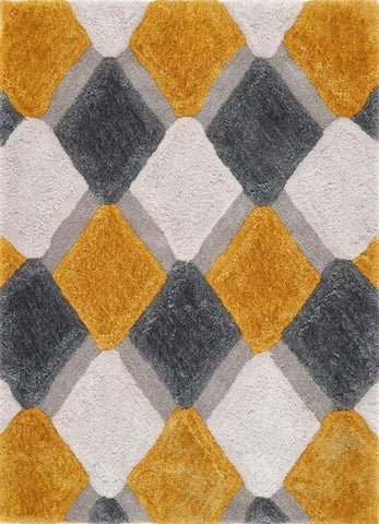 A plush ochre geometric shaggy rug with raised diamond shapes in mustard yellow charcoal gray and off-white