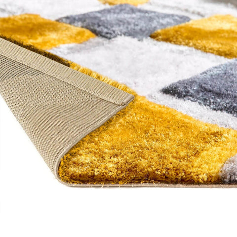 A plush modern 3d ochre geometric shaggy rug in mustard yellow gray and white perfect for cozy spaces