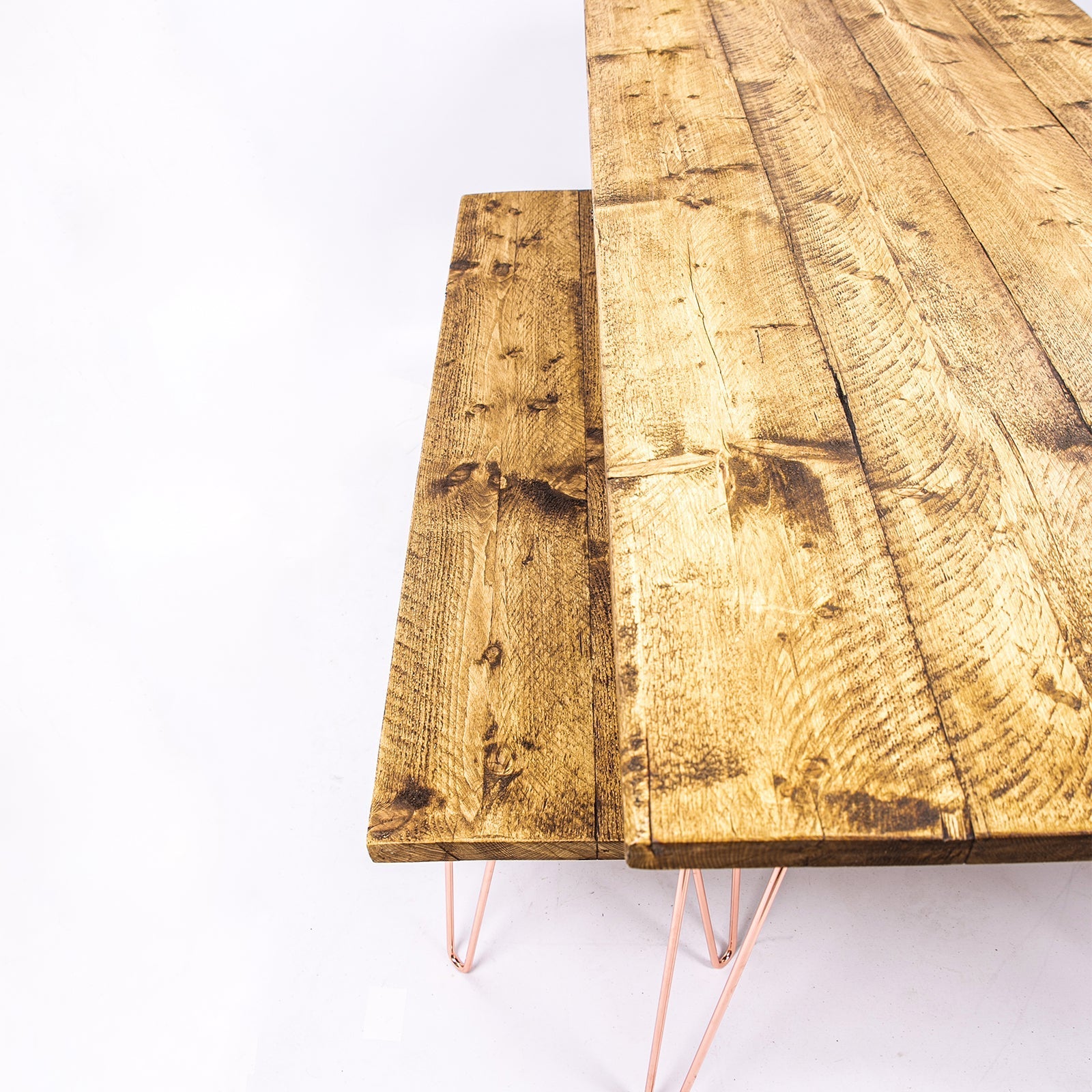 Rustic wooden dining table with rose gold copper hairpin legs perfect for 4-8 seater sets and furniture care kit use