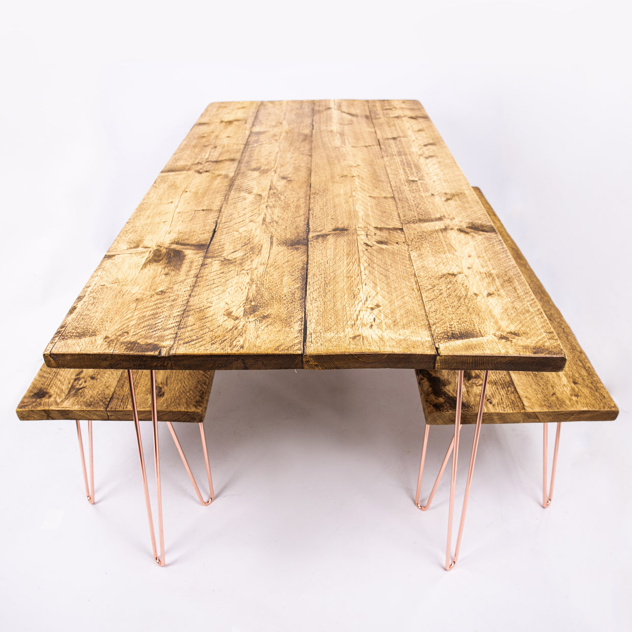 Rustic wooden dining table with rose gold copper hairpin legs perfect for 4-8 seater sets and furniture care kit use