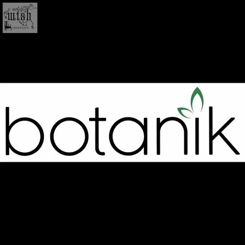 Botanik logo in black lowercase with green leaf emblem above k on a 40cm podocarpus bush artificial plant pack