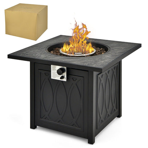Black square pit table with stone-like top, decorative paneling, and stainless steel burner blazing with flame