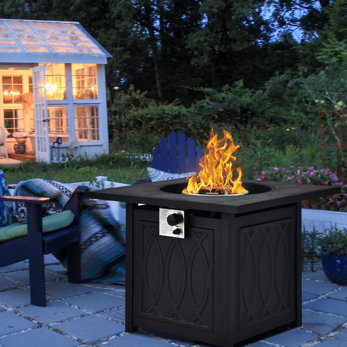 Black square pit table with stainless steel burner and decorative paneling featuring a 50,000 BTU propane flame