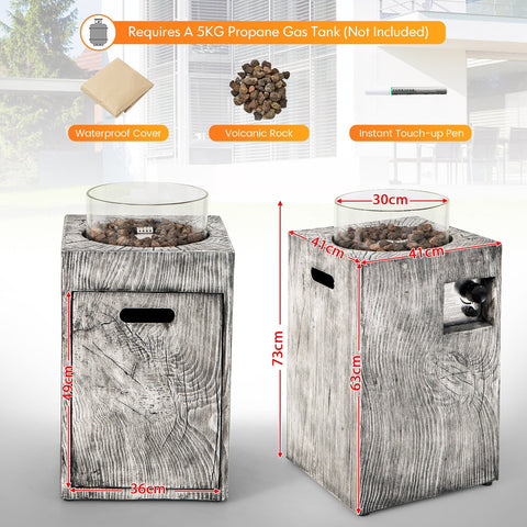Gray wood-grain textured outdoor propane gas pit table with glass wind guard and volcanic rock interior