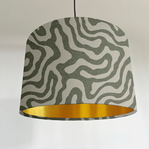 Green wiggle drum lampshade/ ceiling shade, with a metallic brushed gold lining