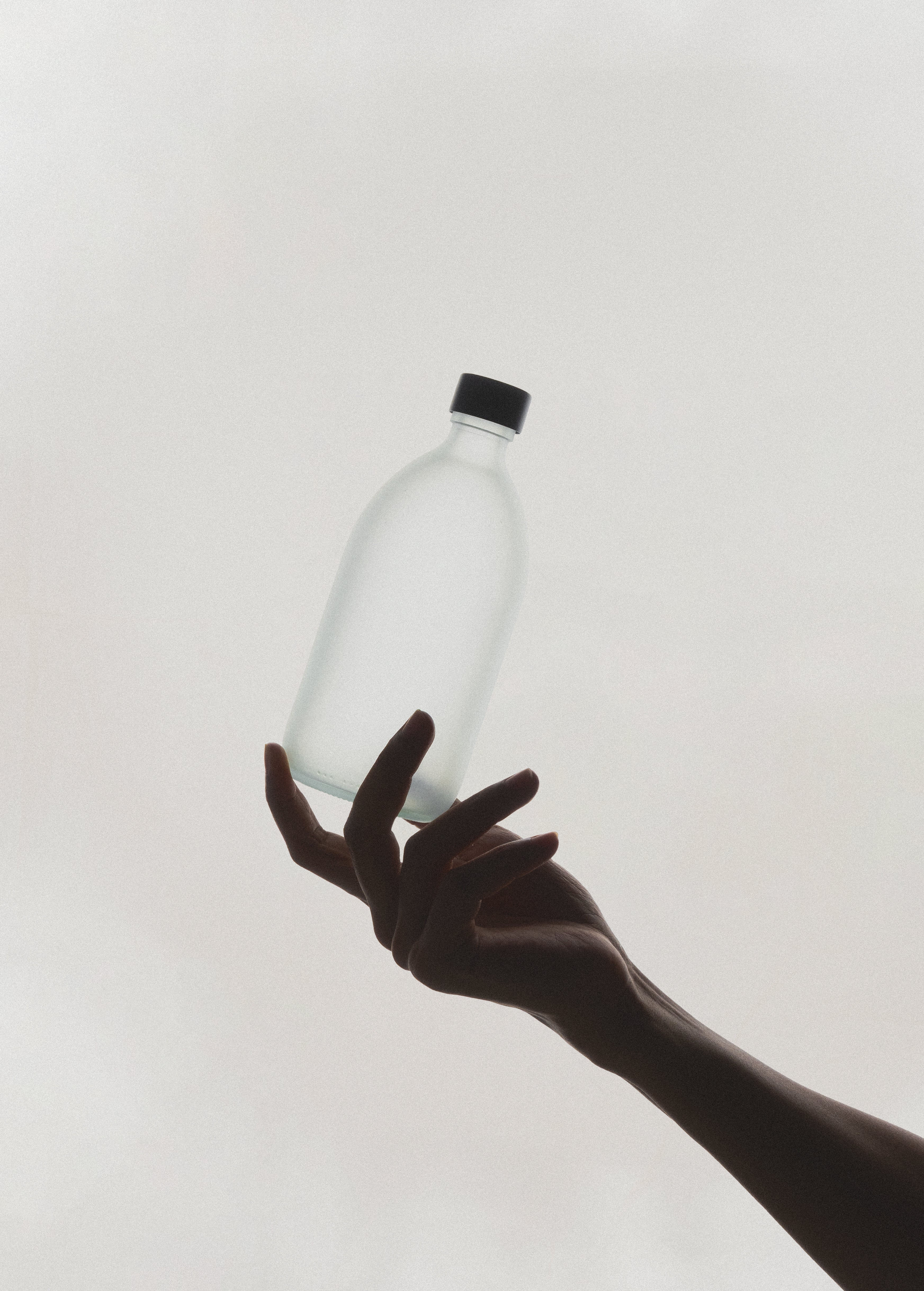 White Glass Bottle and Cap