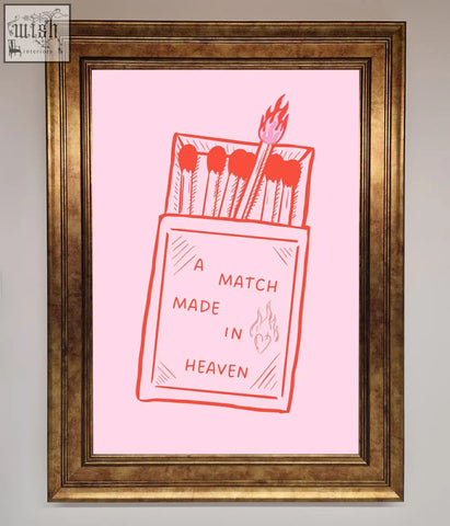 Pink matchbox illustration with red line art and a match made text in a gold heaven framed wall art frame