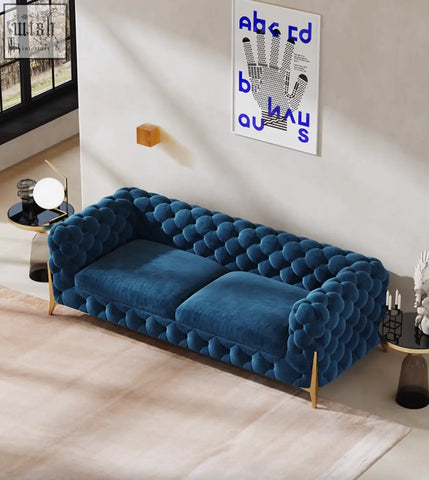 Aaron two seater sofa in deep blue velvet with tufted bubble texture and gold tone legs offers financing and low shipping cost