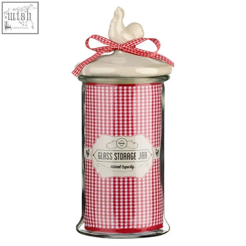Abbie glass storage jar 1650ml red and white checkered glass storage jar with cream lid topped by chicken figurine