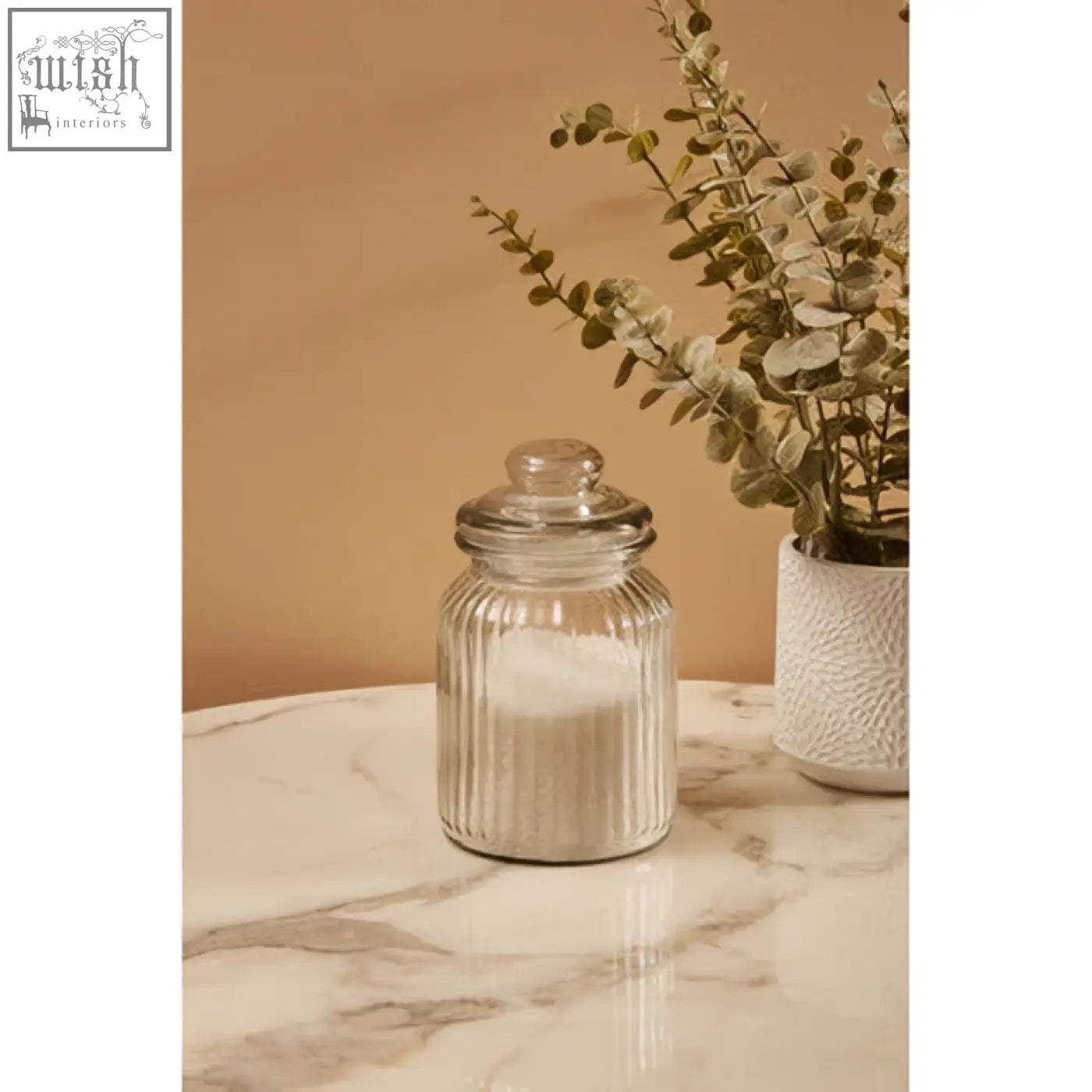 Clear abbie ribbed glass storage jar 1000ml with vertical ridges and matching lid holding white granules