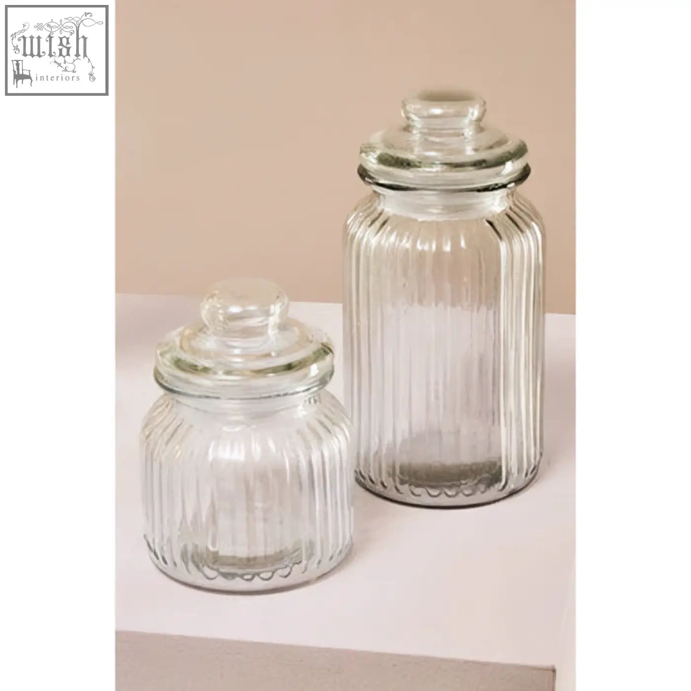 Clear glass storage jar with vertical ridges and matching lid from abbie ribbed glass storage collection 1300 ml capacity