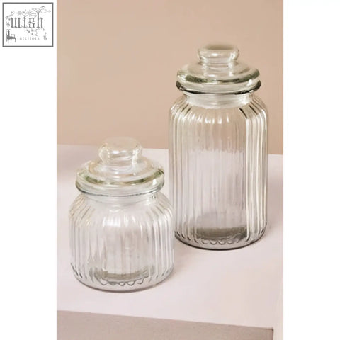 Clear glass storage jar with vertical ridges and matching lid from abbie ribbed glass storage collection 1300 ml capacity