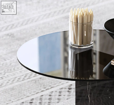Clear glass cylinder with cream taper candles on aberdeen marble coffee table set
